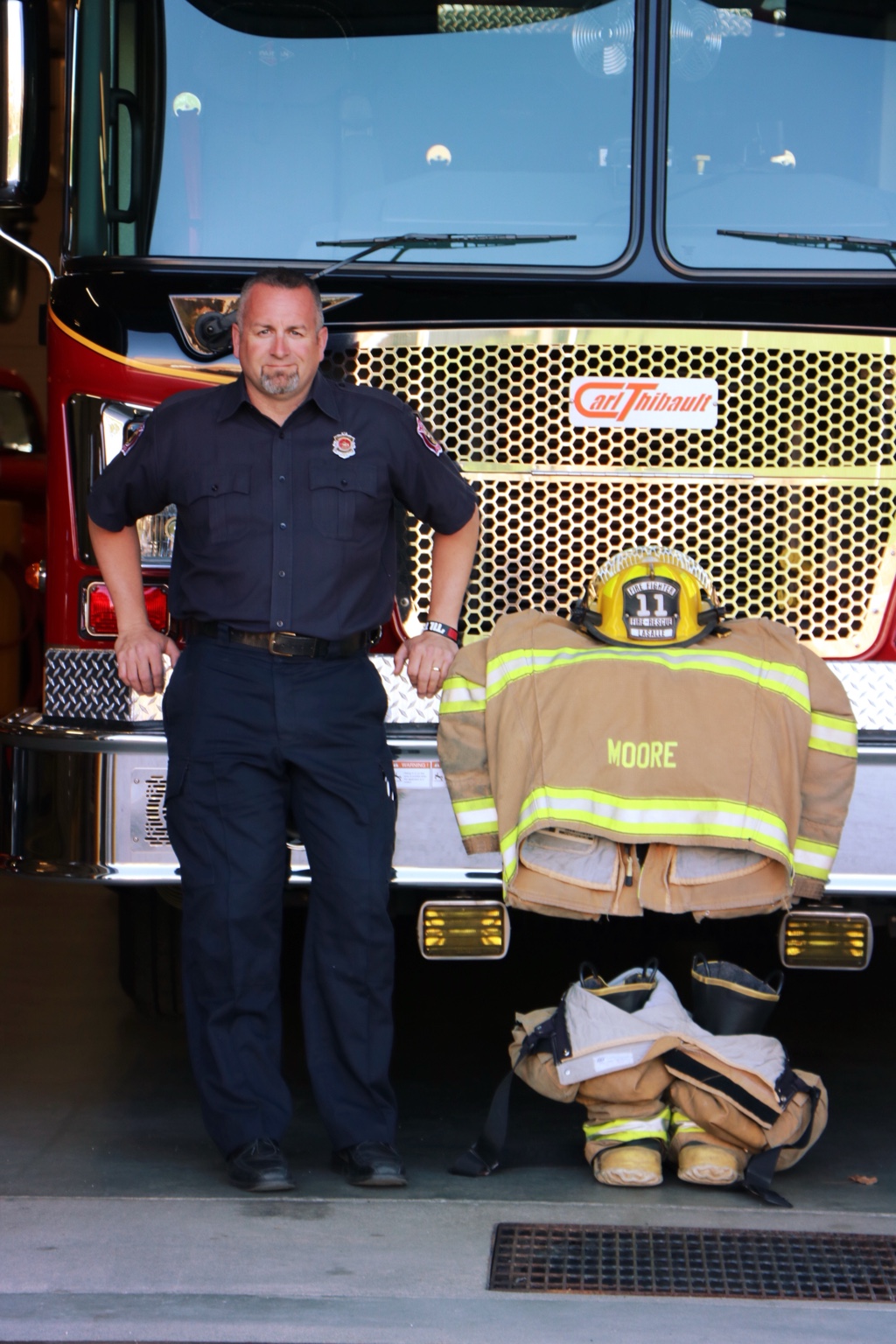 Rob Moore serving as a firefighter